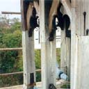 Legs of a church bell tower replaced in sections.