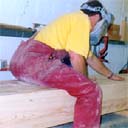 Sanding an enormous laminated beam